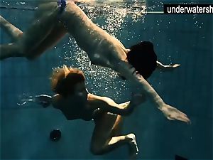 two cool amateurs displaying their bodies off under water